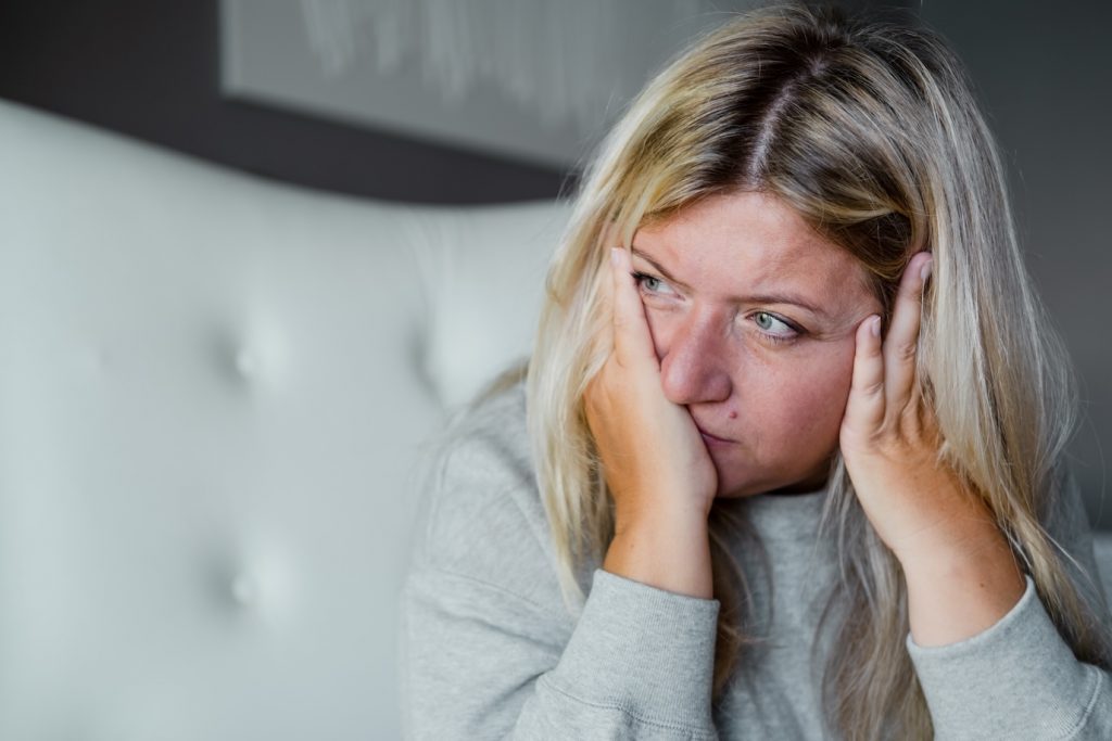 Unhappy woman thinking about health problems Mental health overweight problems